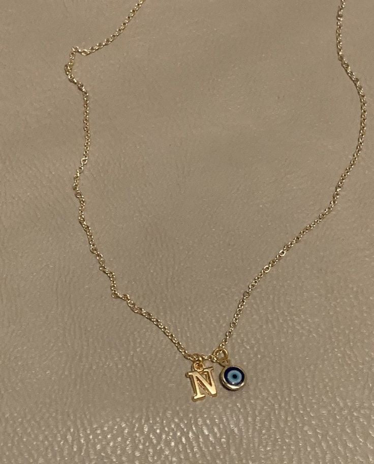 Initial and eye pendant